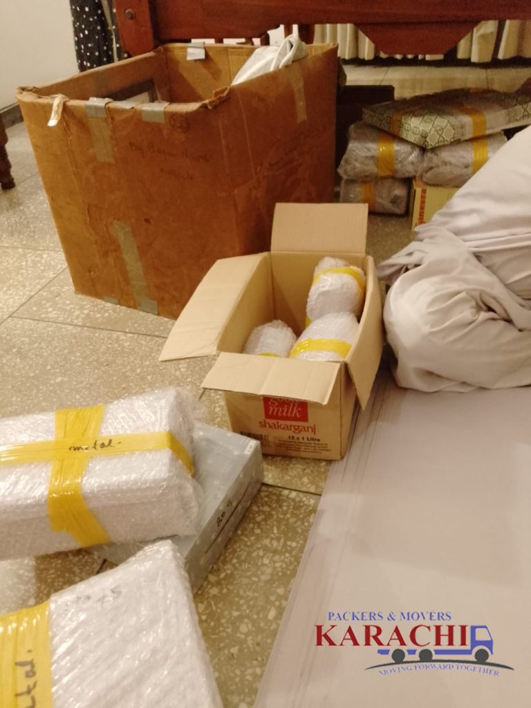 bubble wrappet on fragile items ready to go in strong carton box
