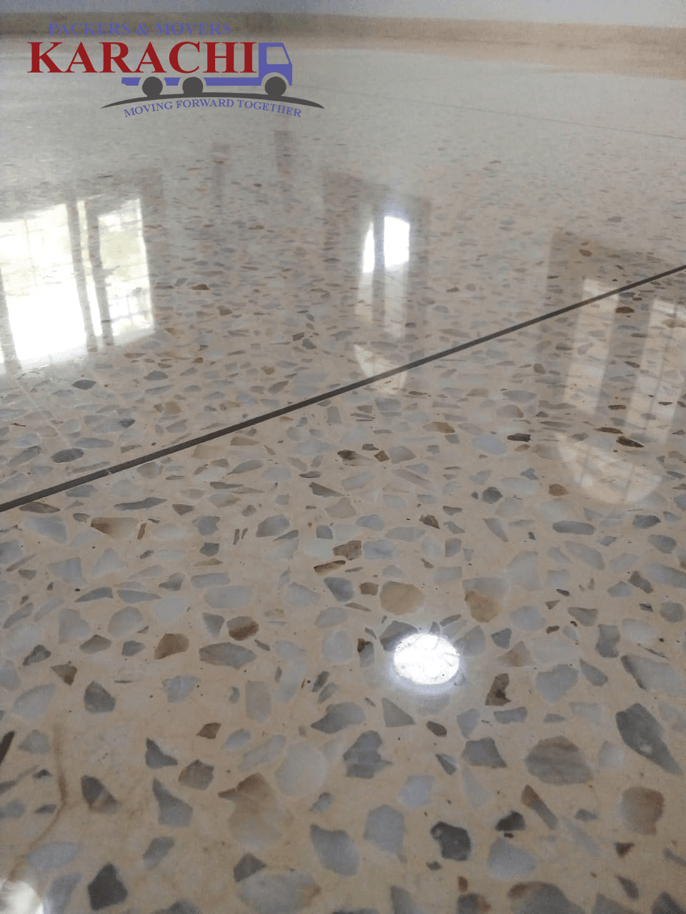 Restored polished terrazzo and marble floor with reflective finish